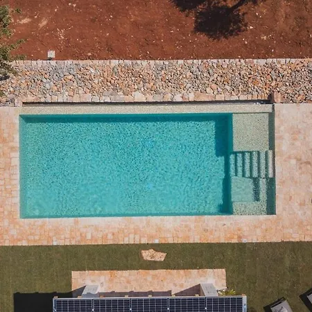 Вилла Lux Apulian Inside Trulli With Unique Pool Кастеллана-Гротте
